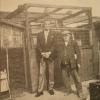 Photo of Bob Funk and Wilf Lovatt standing in front of Wilf's Loft